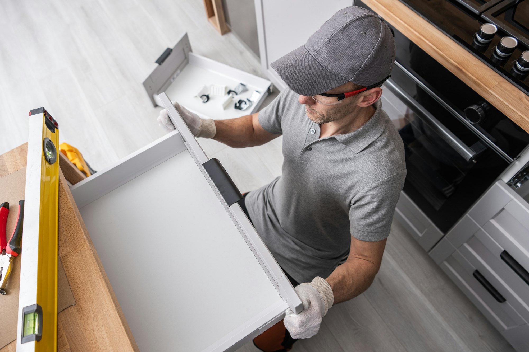 Cabinetmaker Fitting Kitchen Furniture Drawer